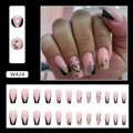 Detail view of pink press-on nails with black V-shaped French tips and gold glitter lines - Flash Black Gold (W424)