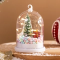 Close-up of a Christmas snow globe with LED lights, mini tree, and colorful foam beads - B (warm Light)