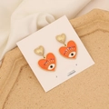 Dettaglio orecchini a cuore in smalto arancione con malocchio e cristalli colorati - Cuore Malocchio (4# Arancione) / Arancione