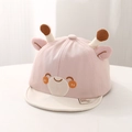 Dettaglio di un cappello da sole rosa per neonati in cotone con corna di giraffa - 46-48cm (6-20 Mesi) / Rosa