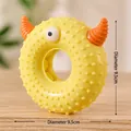Yellow monster pet chew toy with orange horns and massage bumps, 9.5cm diameter size - Hoop Style / Yellow