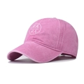 Detail view of pink washed canvas baseball cap with white MAMA embroidery and vintage texture - Adjustable / Pink (Circle Label MAMA)