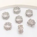 Hollow floral silver rings set with white zircon stones on clean white display background - Micro Pave Hollow Spacer 6x11mm ID 7mm / Platinum/Color Retention