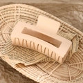 Matte nude rectangular hollow hair claw clip for women on vintage newspaper background - 8.5cm Latte