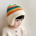 Detail of baby knitted earflap hat featuring colorful stripes and cute cat ear design - Creamy White - Rainbow