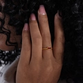 Minimalist gold titanium steel ring with a rectangular red zircon stone on finger - Gold Red Zirconia (A495)