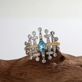 S925 sterling silver ring with pear-shaped blue gemstone and gold accents - Topaz Pear-Shaped Two-Tone Style (LR213)