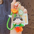 Cute Tang Dynasty style cartoon doll keychain with green top and orange floral skirt charm - Green