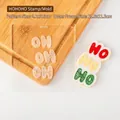 HoHoHo Christmas acrylic cookie stamp for fondant with colorful finished cookies - Pattern 4.1x7.6cm/Frame 11.8x11.2cm