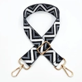 Detail of wide geometric wave pattern bag strap with adjustable gold metal buckle - Light Gray Black Triangle