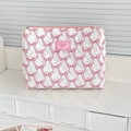 Quilted cotton cosmetic bag with pink bow patterns and a secure top zipper closure - Clutch Bag / Pink