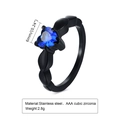 Macro shot of 6mm heart-shaped blue cubic zirconia on a black stainless steel ring band - US 5 / Women's Black + Blue Zirconia