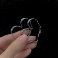 Minimalist silver heart twisted hoop earrings with a polished metallic finish - Silver Heart Hoop Earrings