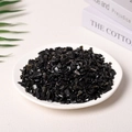 Irregular natural black obsidian crystal stones displayed in a white ceramic dish - Obsidian (5-7mm) 100g