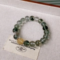 Detail of green rutilated quartz beaded bracelet with yellow crystal and silver accents - Green Phantom Yellow Bead Accented Style (11#)