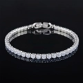 Classic silver tennis bracelet with round cubic zirconia in claw setting on black background - 3mm-18cm / White Zirconia