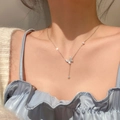 Elegant silver butterfly pendant necklace with crystal tassel on female model neck - Full Diamond Butterfly Style