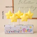 Set of five star shaped yellow party candles in festive packaging for holiday cakes - Yellow Star 5Pcs
