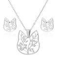 Detailed close-up of silver cat-shaped hollow necklace and stud earrings jewelry set - Hollow Cat Head / Steel
