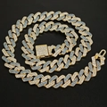 Macro detail of 14mm Cuban link necklace with blue and clear rhinestones on gold plating - Small Clasp Half Blue Gold