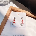 Detail of snowman earrings with red scarf, white enamel, and sparkling zircon stones - Snowman