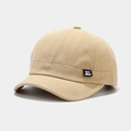 Detail view of khaki cotton canvas miki hat featuring a side logo label and woven texture - Adjustable / Khaki