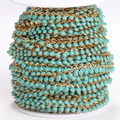 Bohemian gold-plated turquoise bead chain on a white spool for DIY jewelry making - Turquoise Gold Color