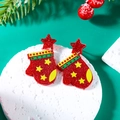 Macro detail of red glove Christmas earrings with festive glitter and star patterns - Red Glitter Christmas Glove (ER24Y0548-5)