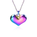 Detail view of the iridescent heart pendant with gradient metallic finish and delicate chain - Necklace Set / Rainbow