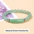 Green Aventurine beaded bracelet featuring a rectangular centerpiece with silver spacers - Natural Green Aventurine