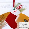 Red knit Christmas stocking with embroidered letter Z hanging on a festive mantel - Letter Z / Red