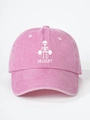Close-up of pink washed cotton baseball cap featuring deadlift skeleton graphic print - Adjustable / Pink