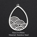 Macro view of 21x30mm stainless steel teardrop pendant with hollow wave pattern - Silver Water Drop Sea Wave (21x30mm)