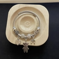 Silver beaded bracelet with heart, bear, and bow charms on a twisted steel wire ring - Steel Color Heart Bear Bracelet