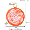 Detail view of orange slice acrylic charm with dimensions 13x16mm and hole size 2mm - Orange Slice