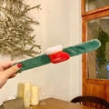 Green plush slap bracelet featuring a red Christmas boot with Merry Christmas embroidery - Christmas Sock