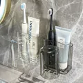 Wall-mounted toothbrush holder set in transparent clear and smoke grey finishes - Couple 2 Pieces Set - Transparent + Grey