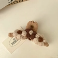 Detail of plush knitted flower hair claw clip in brown and cream yarn textures - Khaki Knitted Flower Claw Clip