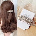 Golden feather spring hair clip with white rhinestones and a large teardrop stone - Full Rhinestone Peacock Feather Spring Clip