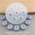 Macro detail of a 7-cavity blueberry silicone mold with molded fruits and size indicators - XL Size 7-hole Blueberry Mold