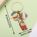 Portachiavi unicorno arcobaleno con ciondoli Love Wins e mongolfiera su sfondo verde - Set Arcobaleno (Mongolfiera/Arcobaleno/Cuore)