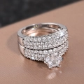 Sparkling zircon wedding ring set with a six-prong round center stone in silver - US 7 / White Gold
