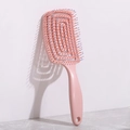 Pink vented hair brush with spiral design and massage bristles for quick blow drying - Pink