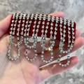 Silver fringe tassel earrings with sparkling rhinestones on a red display card - Wine Red Velvet Rhinestone Tassel Clip