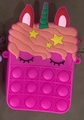Detail of pink silicone unicorn pop-it shoulder bag with star and bubble texture - Rose Red