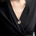 Elegant gold butterfly brooch with shimmering white zircons on black satin fabric - Double Butterfly Style (40206A)