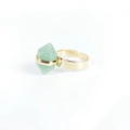 Detailed macro view of an adjustable gold ring with a green hexagonal column crystal - Green Aventurine