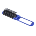 Detalle del cepillo de pelo plegable azul con cerdas de masaje negras y puntas suaves - Azul