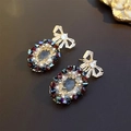 Golden bow earrings with oval crystals and pearl border on a brown textured surface - 33# Silver Pin - Colorful Bow Oval
