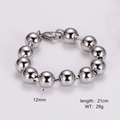 Polished stainless steel bead bracelet with 12mm spheres and lobster clasp detail - Bracelet / 12mm / Steel